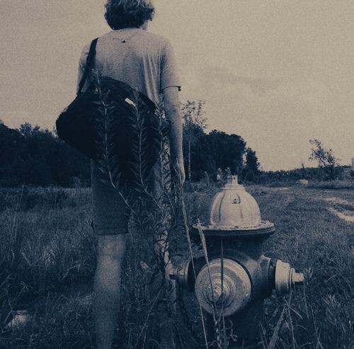 Person next to fire hydrant